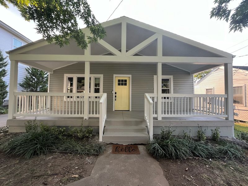 Painted porch awning built by Apex Construct on a Nashville home